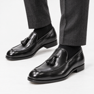 Leonardo italian style tassel loafers in black, side worn view