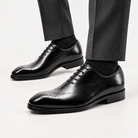 Leonardo genuine leather premium shoes in black, side worn view