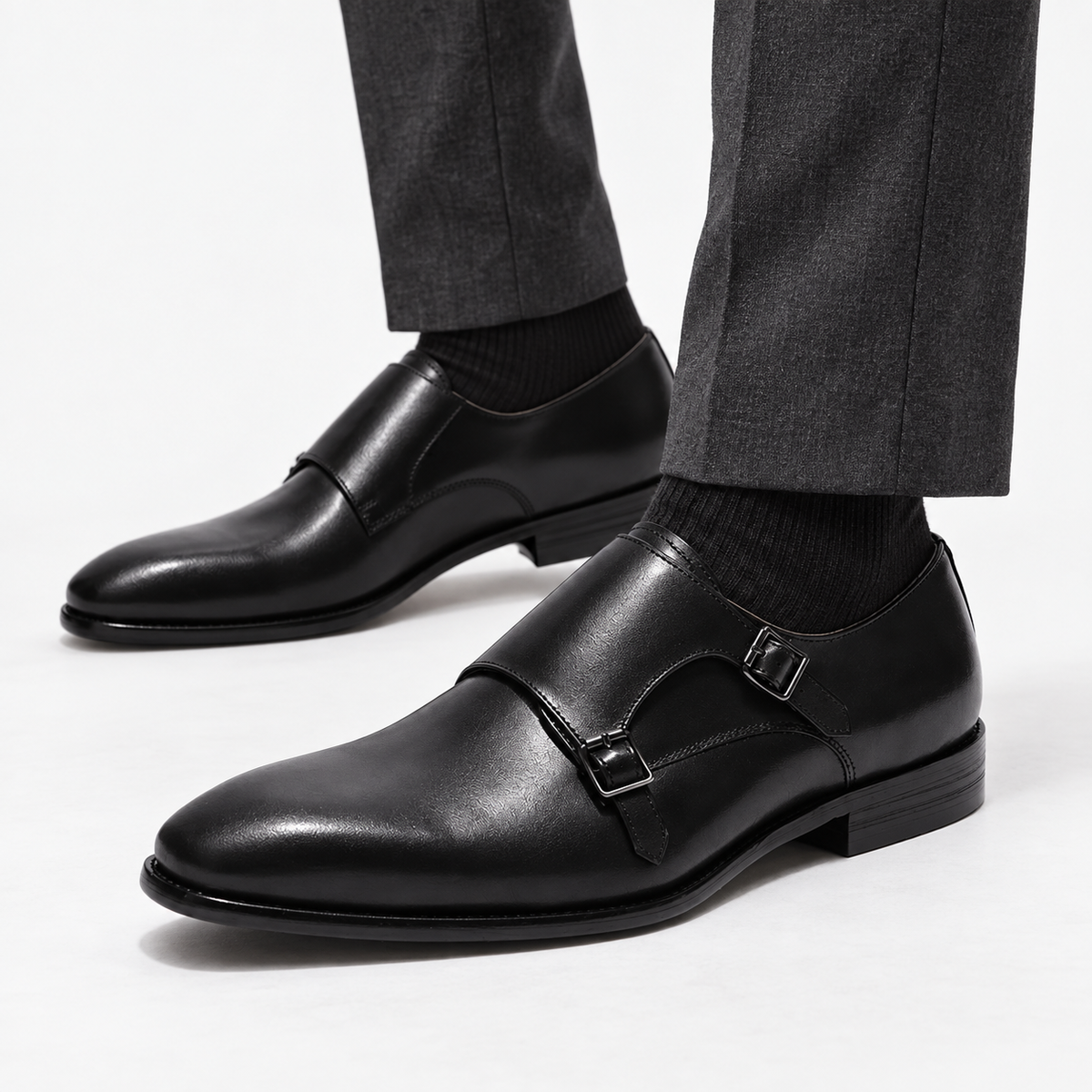 Leonardo monk-strap leather shoes in black, side worn view