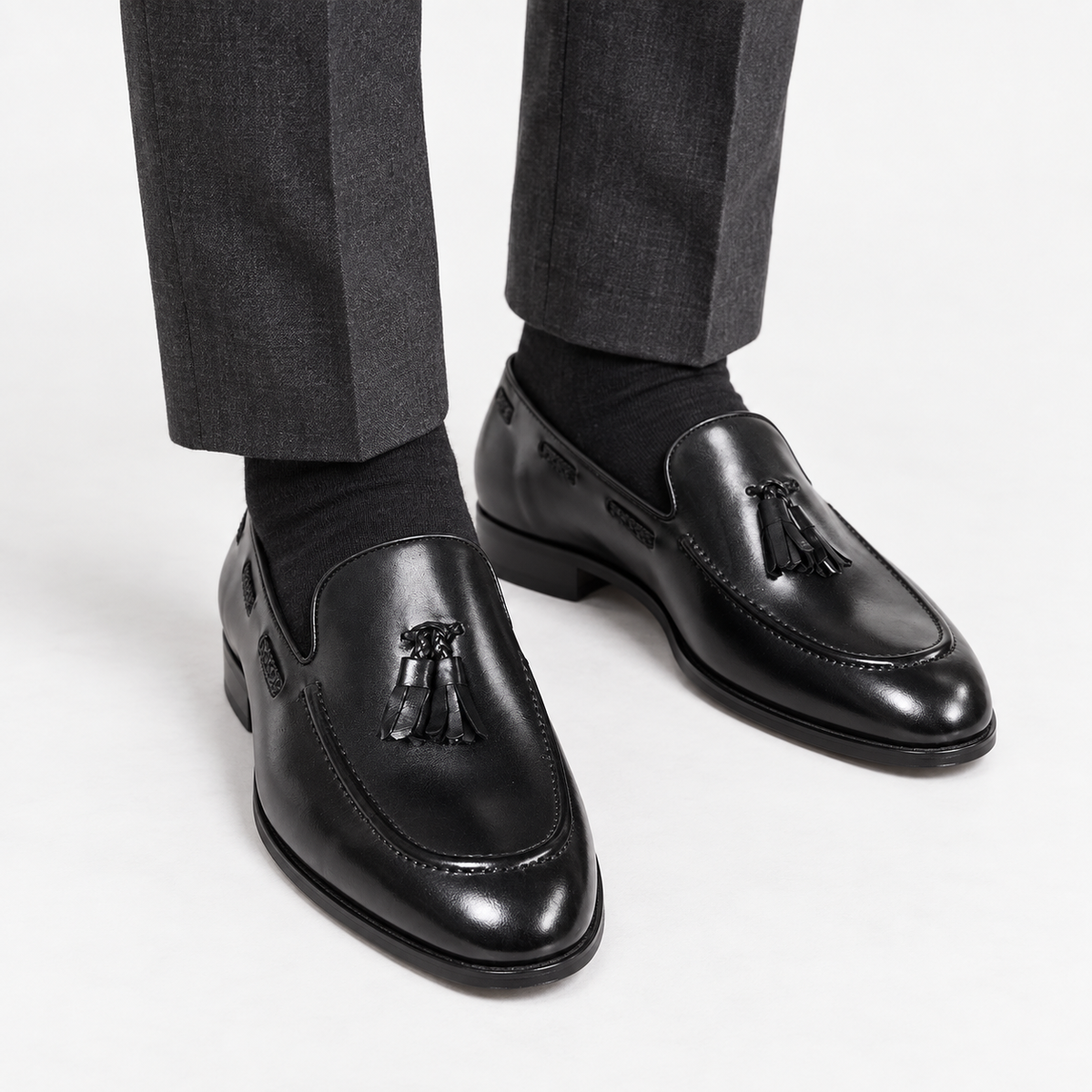 Leonardo tassel genuine leather loafers in black, front worn view