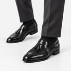 Leonardo tassel genuine leather loafers in black, side worn view
