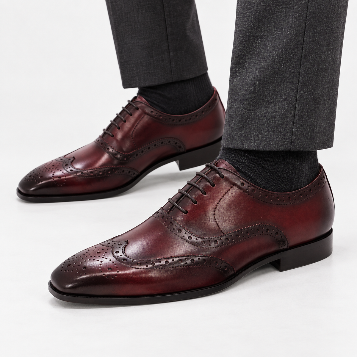 Leonardo genuine leather brogue shoes in wine red, side worn view