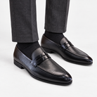 Leonardo genuine leather penny loafers in black, front worn view