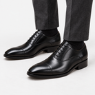 Leonardo oxford genuine leather shoes in black, front worn view