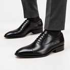 Leonardo oxford genuine leather shoes in black, side worn view