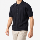 Summer vintage gentleman polo shirt in navy blue, three-quarter model view