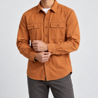 Leo 100% cotton retro utility shirt in orange, side worn view