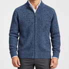 Men's merino wool zip-collar cardigan in blue, front worn view