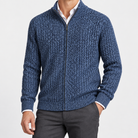 Men's merino wool zip-collar cardigan in blue, side worn view