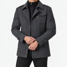 Button front coat with shoulder tabs and zip chest detail in charcoal — male model front view