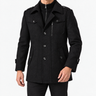 Button front coat with shoulder tabs and zip chest detail in black — male model front view
