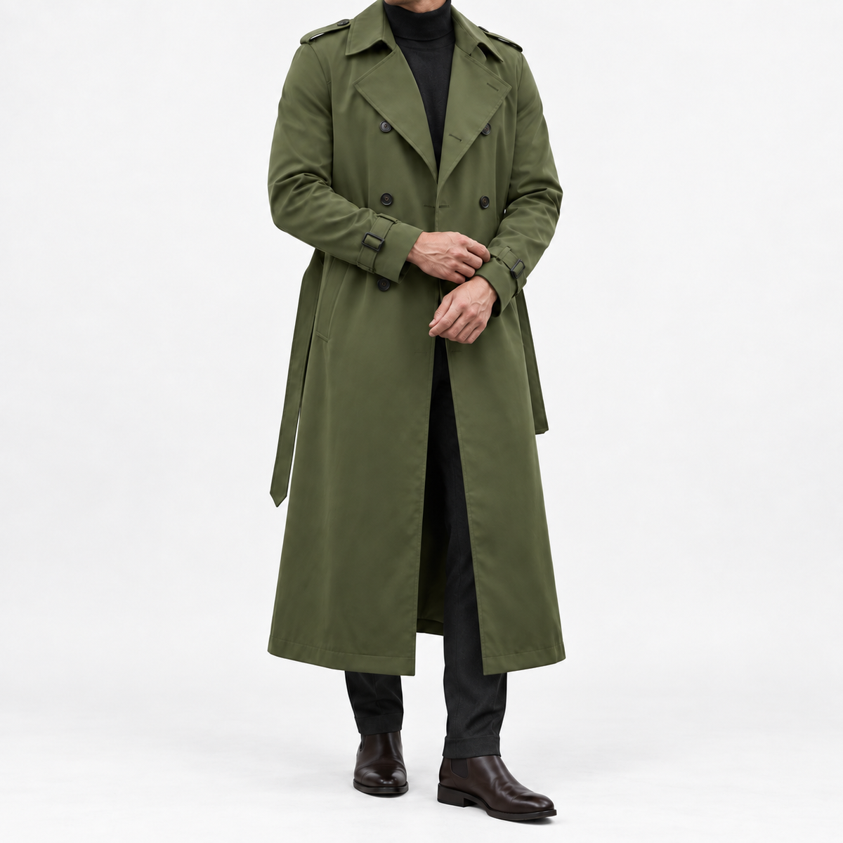 Long double breasted trench coat with a belt in olive green — front view on a male model