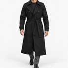 Long double breasted trench coat with a belt in black — front view on a male model