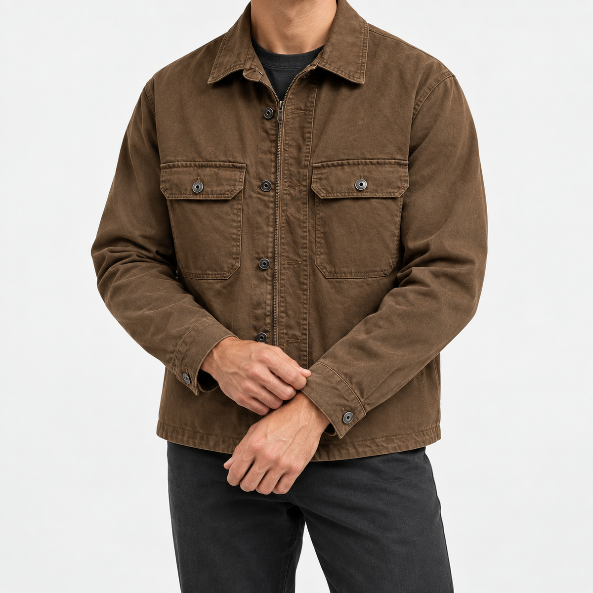 Washed cotton utility jacket with a zip front in brown — front view on a male model