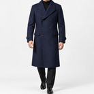 Long double breasted wool blend coat with cuff tabs in navy blue — male model front view