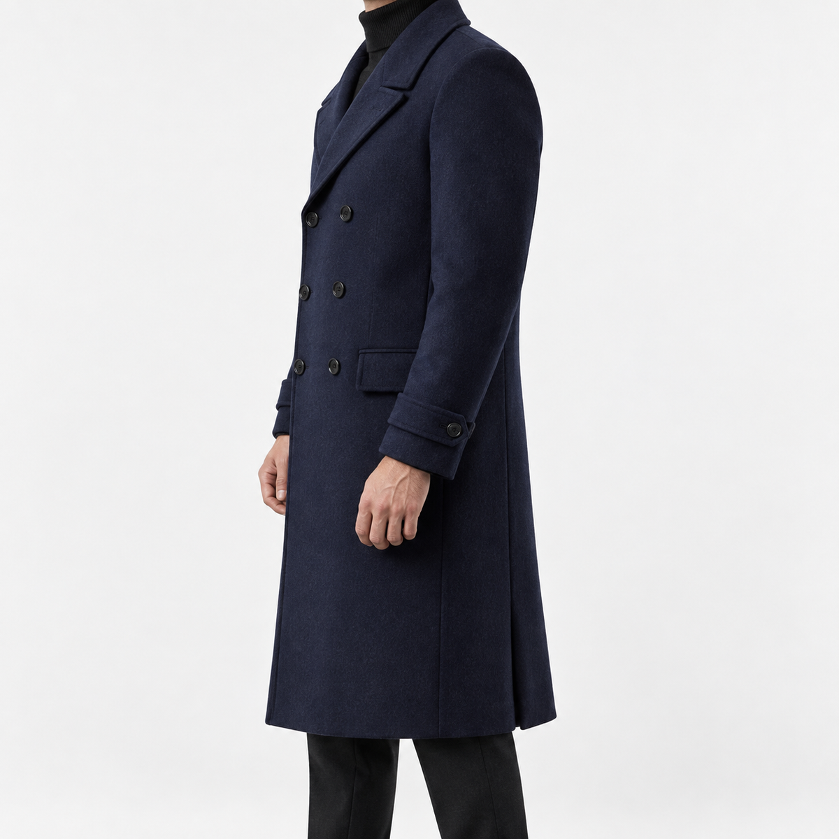 Long double breasted wool blend coat with cuff tabs in navy blue — male model side view