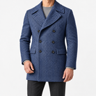 Herringbone double breasted coat with wide lapels in blue — male model front view