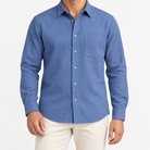 Brushed cotton flannel shirt with a chest pocket in blue on a male model front view