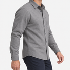 Brushed cotton flannel shirt with a chest pocket in gray on a male model side view
