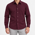 Brushed cotton flannel shirt with a chest pocket in burgundy on a male model front view