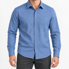 Brushed cotton flannel shirt with a chest pocket in blue microcheck on a male model front view