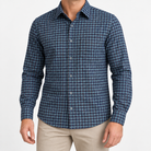 Brushed cotton flannel shirt with a chest pocket in blue gingham on a male model front view
