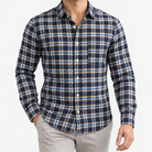 Pure cotton oxford shirt with a chest pocket in navy and gold check on a male model front view