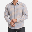 Pure cotton oxford shirt with a chest pocket in light gray and tan check on a male model front view