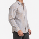 Pure cotton oxford shirt with a chest pocket in light gray and tan check on a male model side view