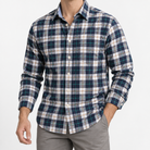 Pure cotton oxford shirt with a chest pocket in navy and green plaid on a male model front view