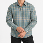 Pure cotton oxford shirt with a chest pocket in sage green check on a male model front view