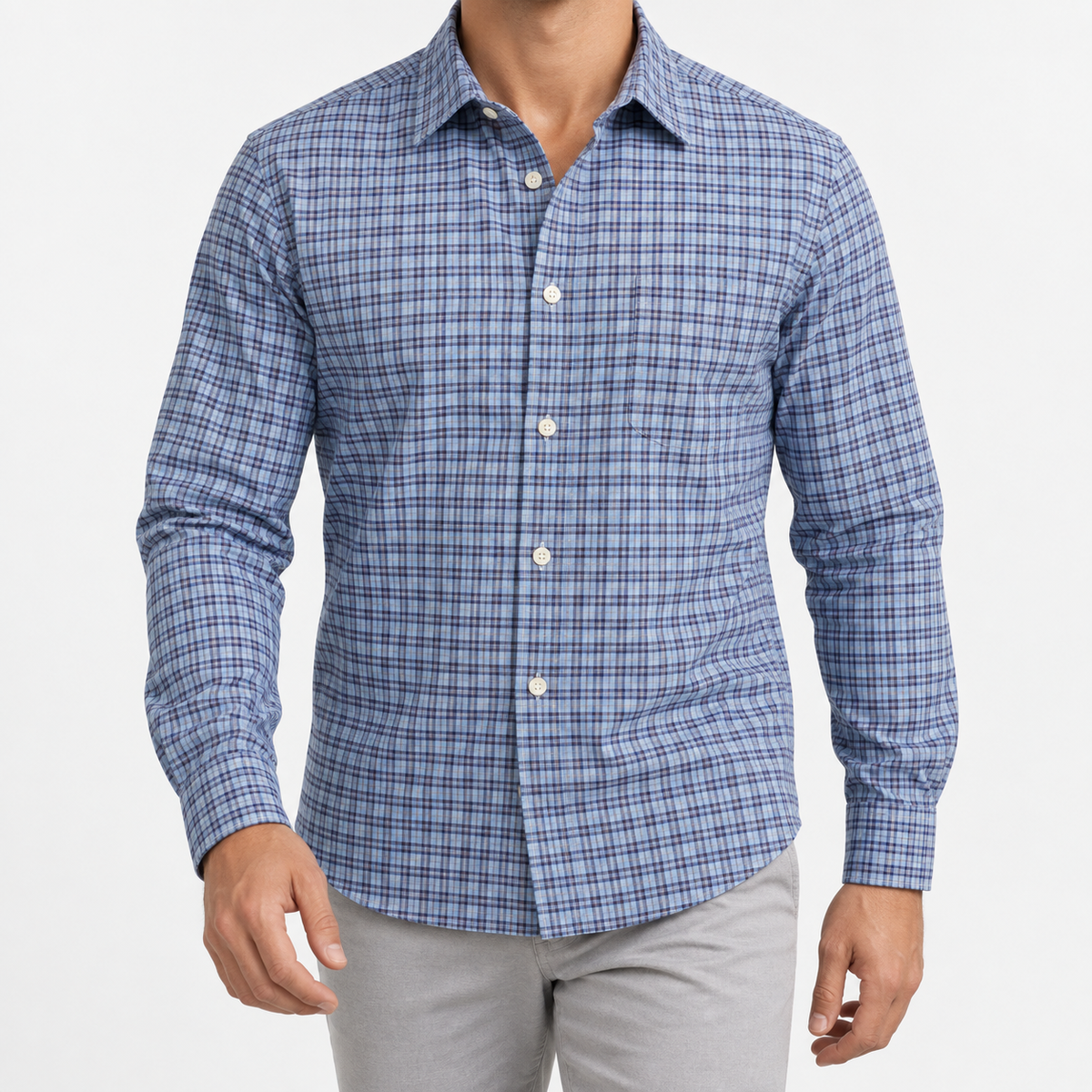 Pure cotton oxford shirt with a chest pocket in blue microcheck on a male model front view