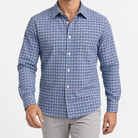 Pure cotton oxford shirt with a chest pocket in blue microcheck on a male model front view
