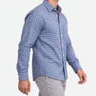 Pure cotton oxford shirt with a chest pocket in blue microcheck on a male model side view