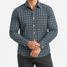 Pure cotton oxford shirt with a chest pocket in navy fine check on a male model front view