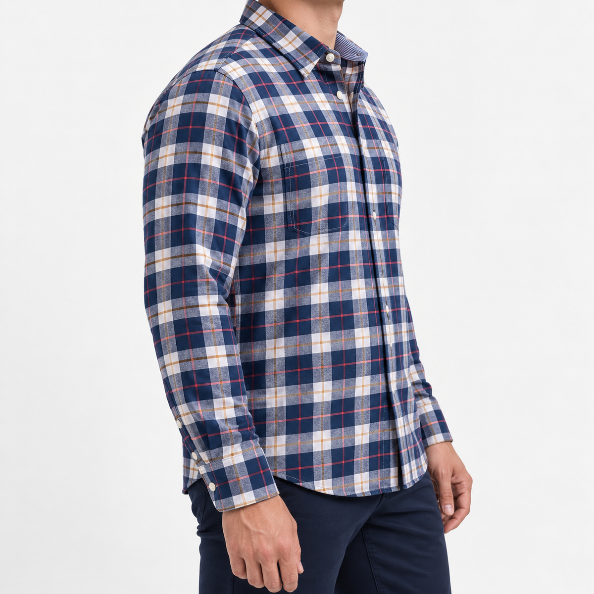 Pure cotton oxford shirt with a chest pocket in navy and red plaid on a male model side view