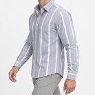 Pure cotton oxford shirt with a chest pocket in light gray wide stripe on a male model side view