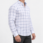 Pure cotton oxford shirt with a chest pocket in white windowpane on a male model side view