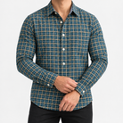 Pure cotton oxford shirt with a chest pocket in dark green check on a male model front view