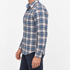Pure cotton oxford shirt with a chest pocket in blue and brown plaid on a male model side view