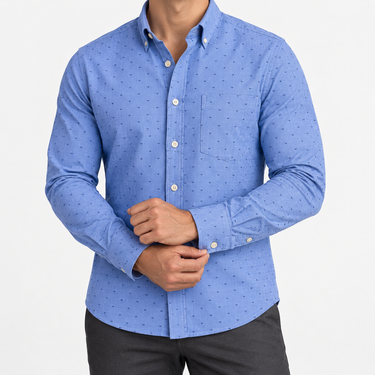 Pure cotton oxford shirt with a chest pocket in blue microprint on a male model front view