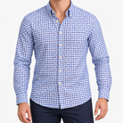 Pure cotton oxford shirt with a chest pocket in blue grid check on a male model front view