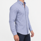 Pure cotton oxford shirt with a chest pocket in blue grid check on a male model side view