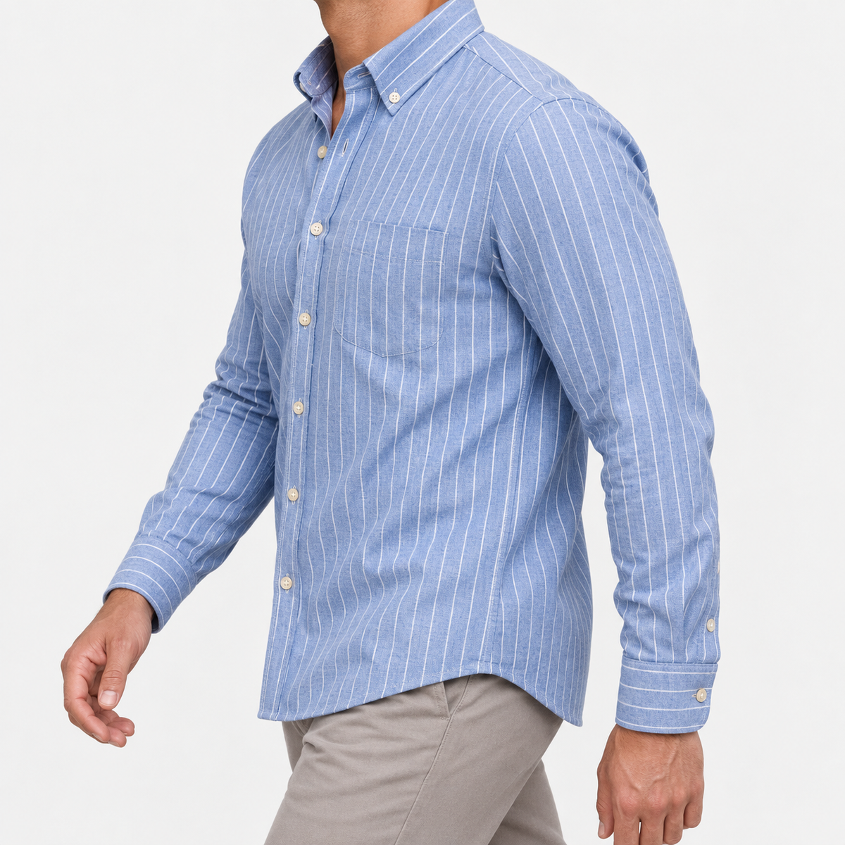 Pure cotton oxford shirt with a chest pocket in light blue pinstripe on a male model side view