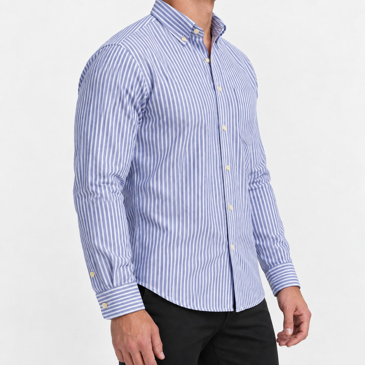 Pure cotton oxford shirt with a chest pocket in blue narrow stripe on a male model side view