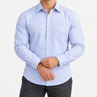Slim cotton blend shirt with a chest pocket in blue fine check on a male model front view