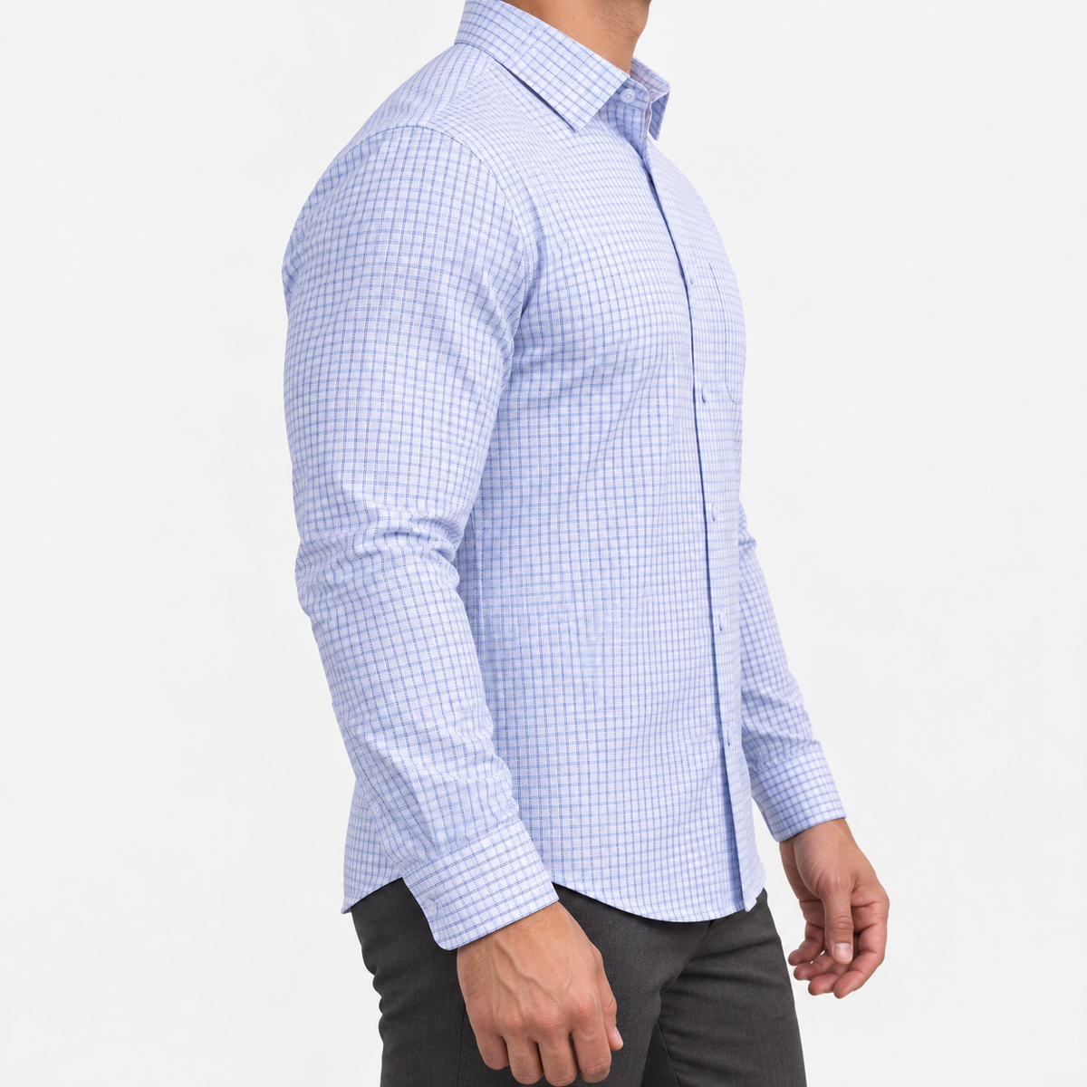 Slim cotton blend shirt with a chest pocket in blue fine check on a male model side view