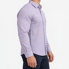 Slim cotton blend shirt with a chest pocket in lilac and tan check on a male model side view