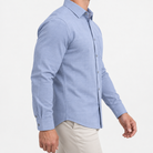 Slim cotton blend shirt with a chest pocket in light gray tonal check on a male model side view