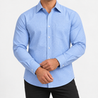 Slim cotton blend shirt with a chest pocket in light blue microcheck on a male model front view